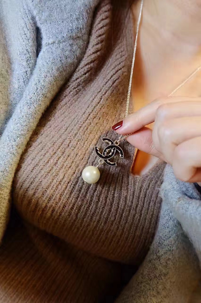 Buy replica Chanel Black Double C Pearl Drop Pendant Necklace and replica jewelry from PICKS Jewelry