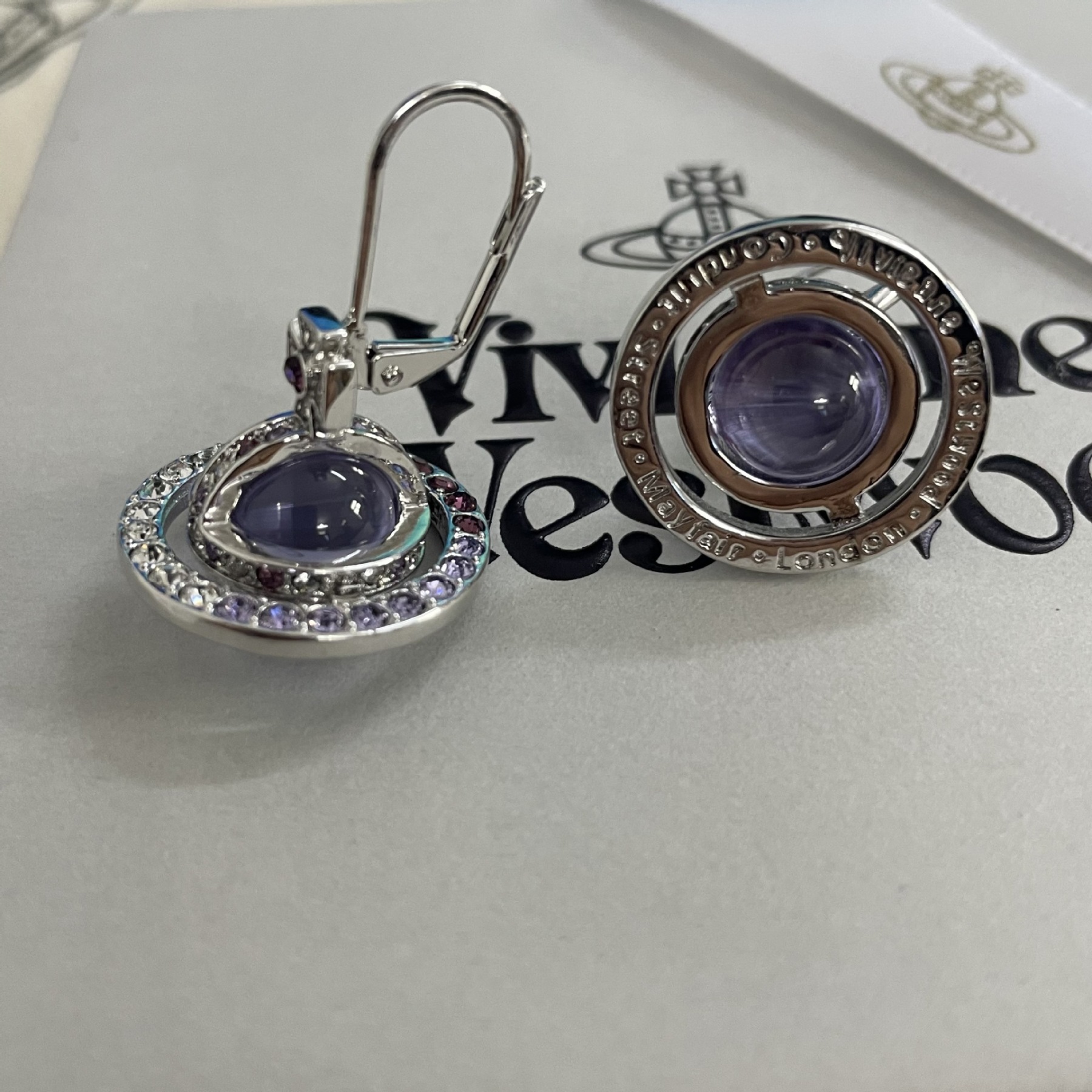Buy replica Vivienne Westwood Light Purple Crystal Ball Planet Saturn Earrings and replica jewelry from PICKS Jewelry