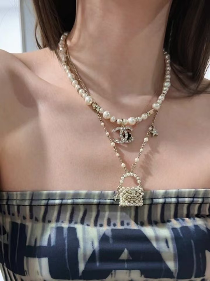 Buy replica Chanel Pearl Bag Pendant Necklace and replica jewelry from PICKS Jewelry