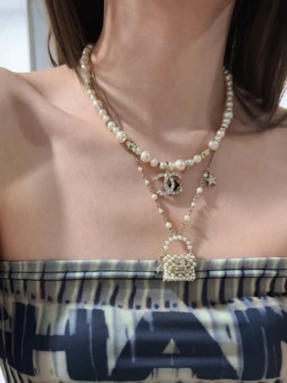 Buy replica Chanel Pearl Bag Pendant Necklace and replica jewelry from PICKS Jewelry