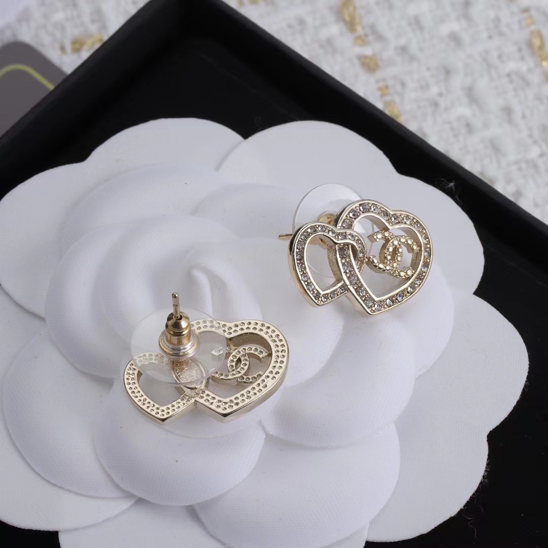 Buy replica Chanel Two Hollow Heart Stud Earrings and replica jewelry from PICKS Jewelry
