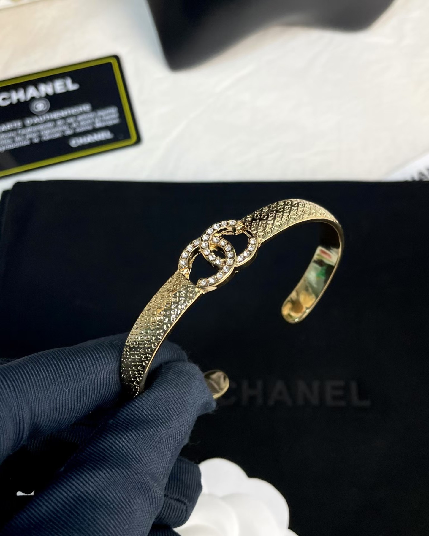 Buy replica Chanel Hollow Diamond Paved Double C Open Bangle Bracelet and replica jewelry from PICKS Jewelry