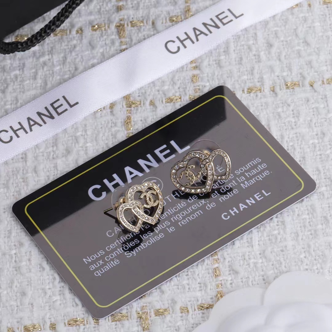 Buy replica Chanel Two Hollow Heart Stud Earrings and replica jewelry from PICKS Jewelry