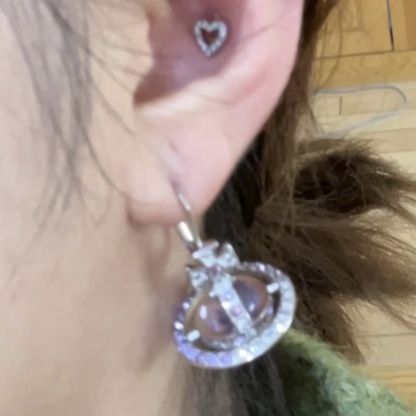Buy replica Vivienne Westwood Light Purple Crystal Ball Planet Saturn Earrings and replica jewelry from PICKS Jewelry