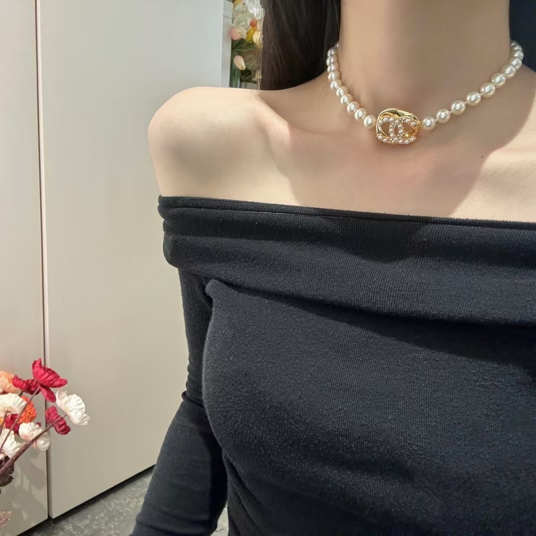 Buy replica Chanel Round Double C Pendant Pearl Choker Necklace and replica jewelry from PICKS Jewelry
