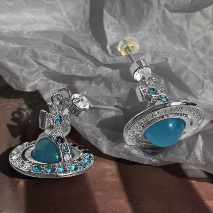 Buy replica Vivienne Westwood Lake Blue Saturn Earrings and replica jewelry from PICKS Jewelry