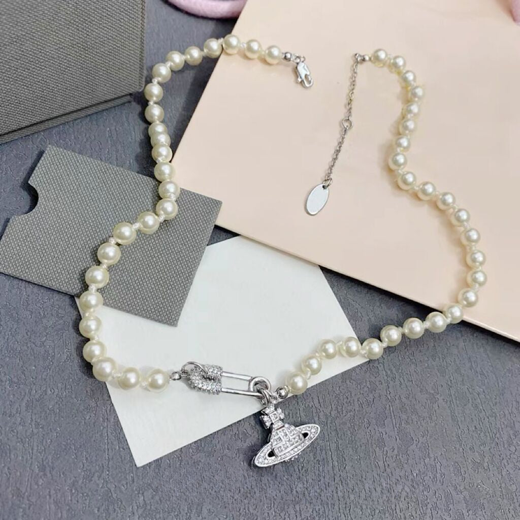 Buy replica Vivienne Westwood Paperclip Saturn Pearl Necklace and replica jewelry from PICKS Jewelry