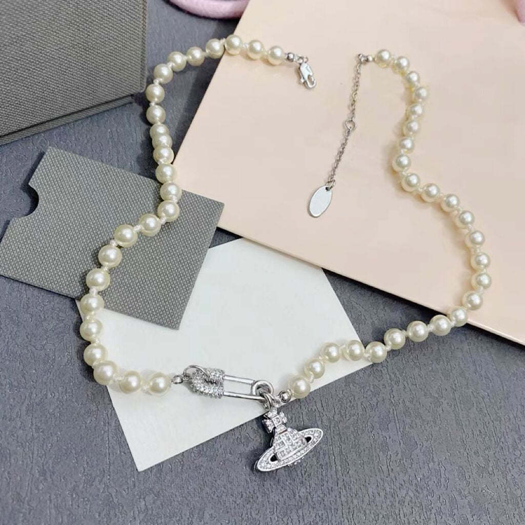 Buy replica Vivienne Westwood Paperclip Saturn Pearl Necklace and replica jewelry from PICKS Jewelry