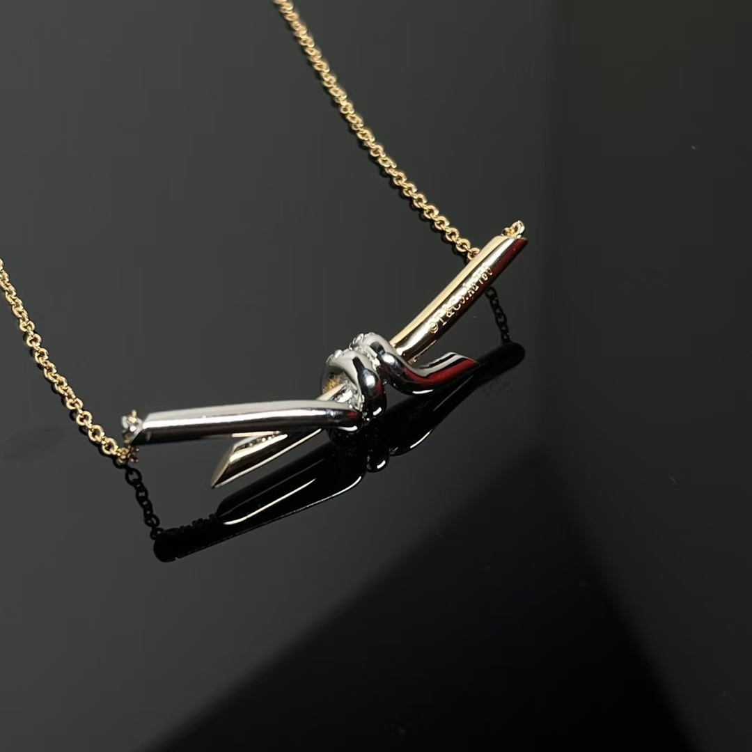 Buy replica Tiffany Knot Pendant Necklace - Mixed Metal Color and replica jewelry from PICKS Jewelry
