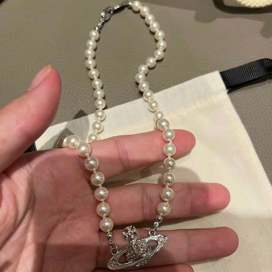 Buy replica Vivienne Westwood Pink Saturn Necklace and replica jewelry from PICKS Jewelry