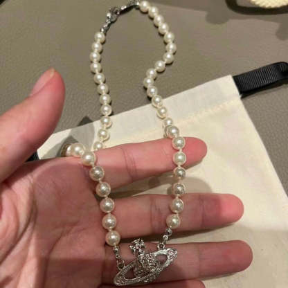 Buy replica Vivienne Westwood Pink Saturn Necklace and replica jewelry from PICKS Jewelry