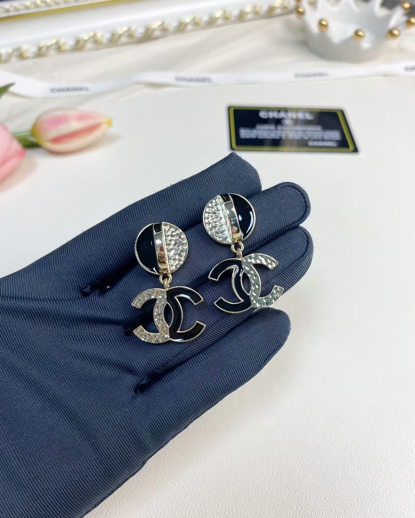 Buy replica Chanel Half Black Enamel Double C Dangle Earrings and replica jewelry from PICKS Jewelry
