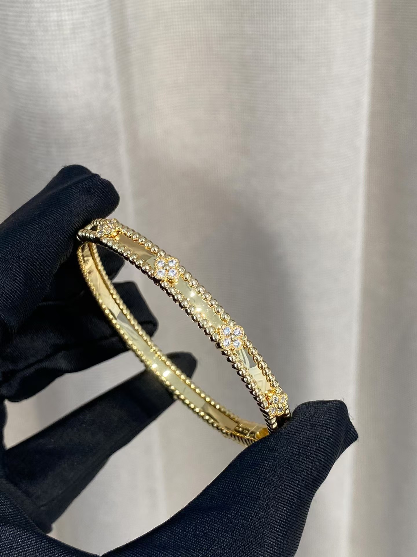 Buy replica Van Cleef & Arpels Perlée Sweet Clovers Bracelet, Medium Model and replica jewelry from PICKS Jewelry