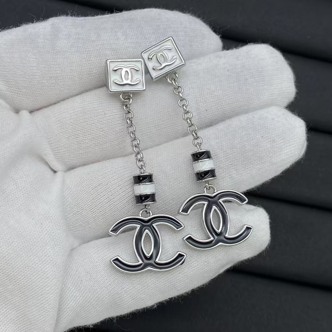 Buy replica Chanel Black White Enamel Chain Tassel with Double C Earrings and replica jewelry from PICKS Jewelry