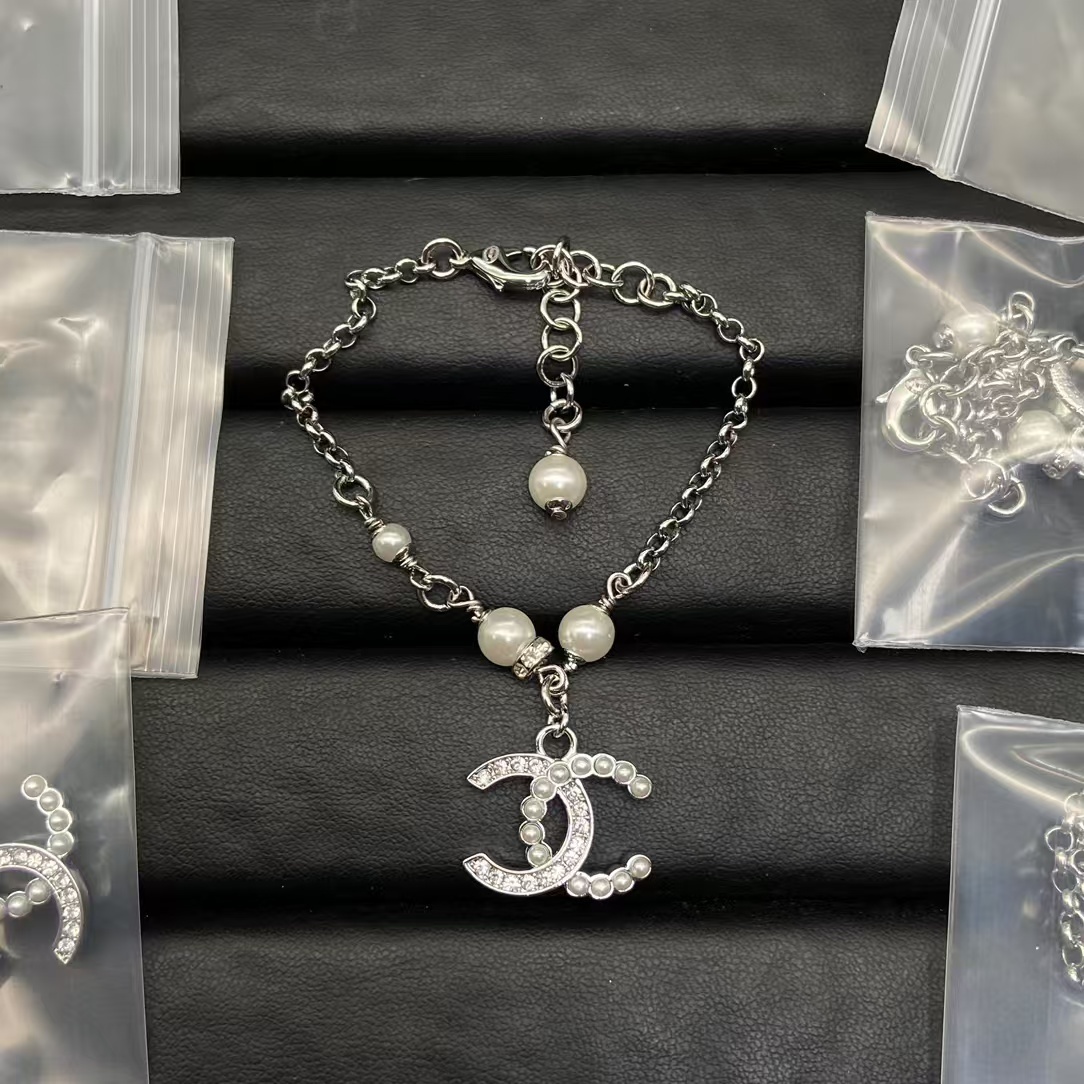 Buy replica Chanel Large Double C Charm Bracelet and replica jewelry from PICKS Jewelry