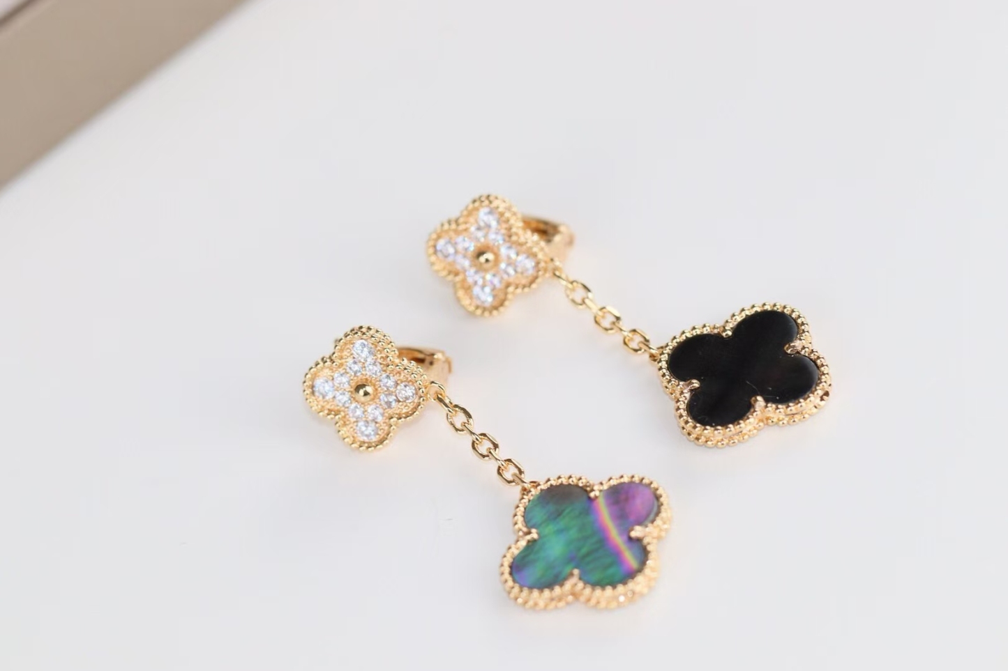 Buy replica Van Cleef & Arpels Grey Mother of Pearl Magic Alhambra Earrings 2 Motifs and replica jewelry from PICKS Jewelry