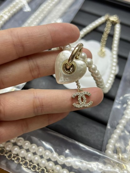 Buy replica Chanel Heart with Double C Pendant Drop Pearl Necklace and replica jewelry from PICKS Jewelry