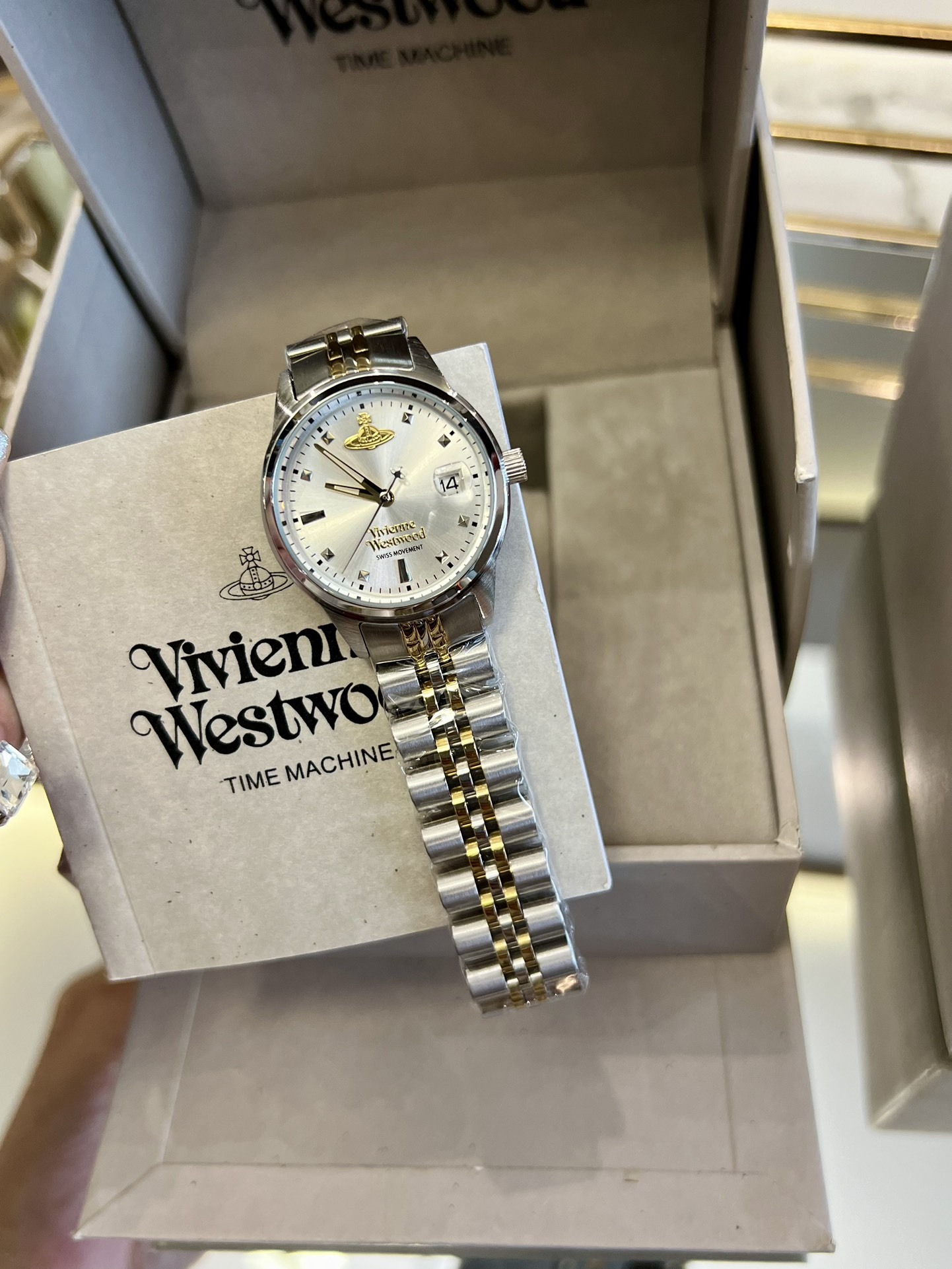 Buy replica Vivienne Westwood Silver Gold Mixed Color Band Watch - 30MM and replica jewelry from PICKS Jewelry