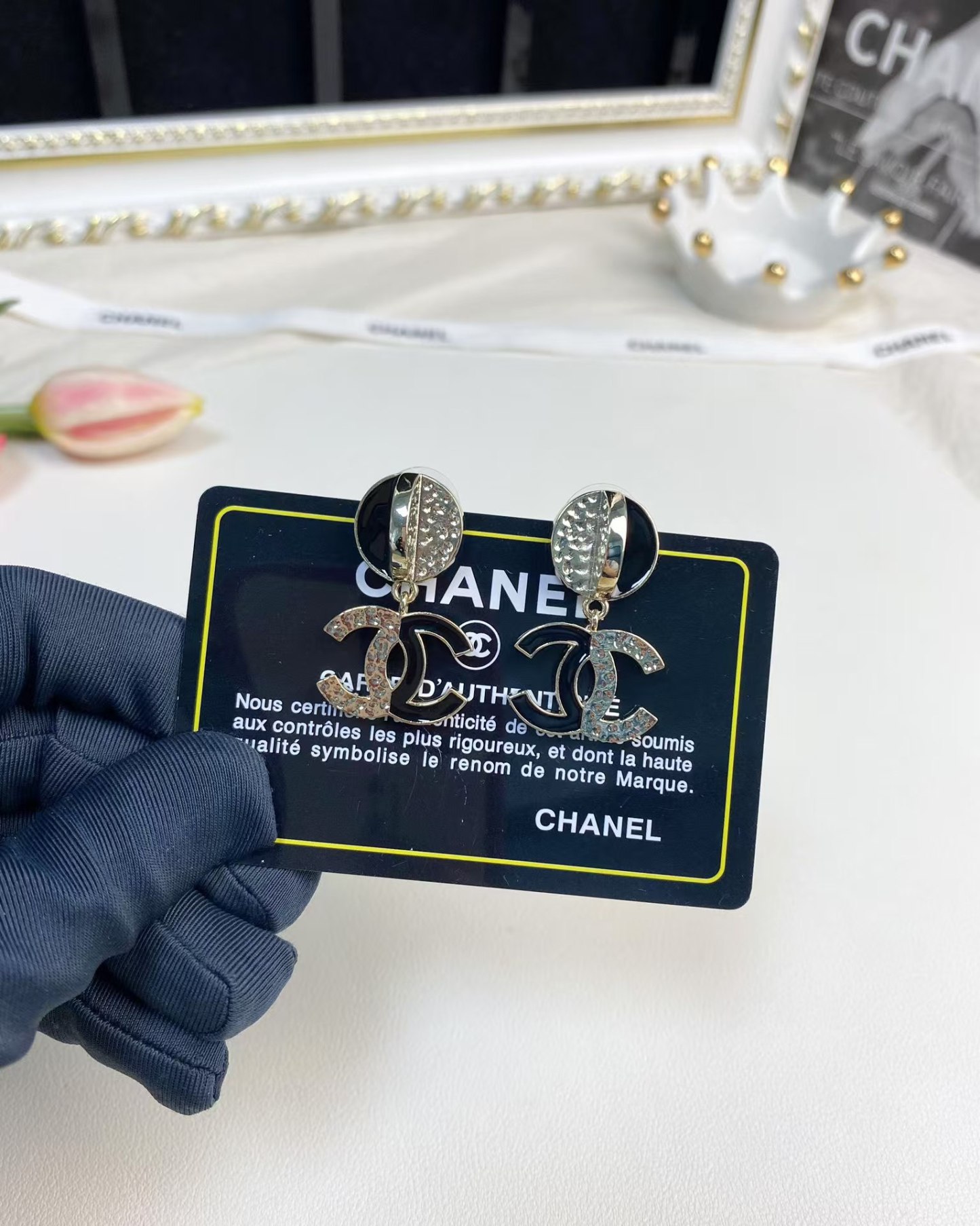 Buy replica Chanel Half Black Enamel Double C Dangle Earrings and replica jewelry from PICKS Jewelry