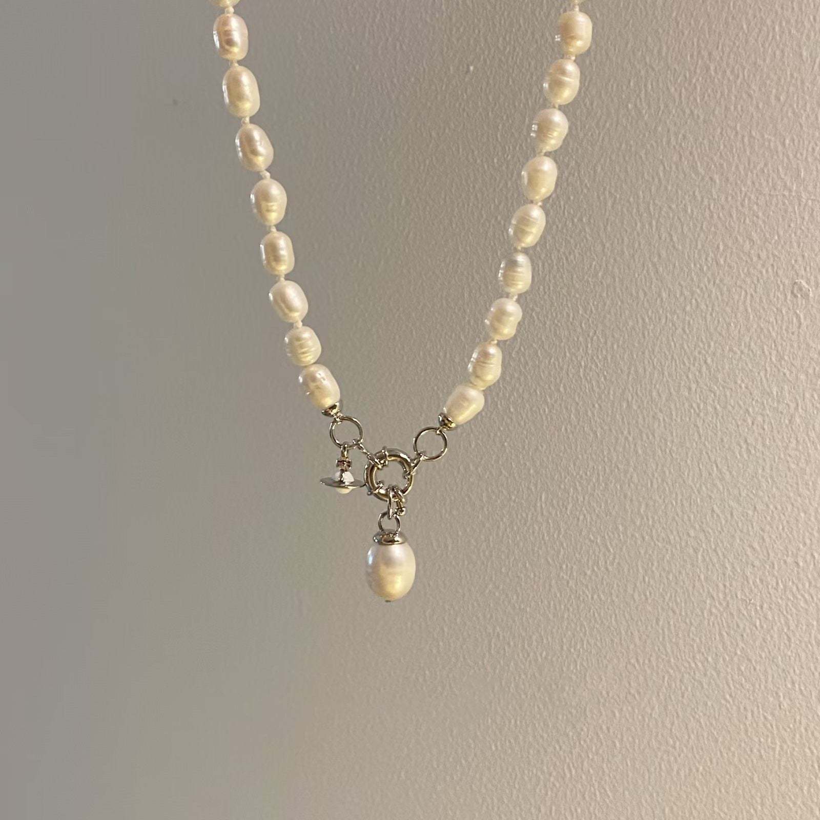 Buy replica Vivienne Westwood Teardrop Pearl Charm Pendant Necklace and replica jewelry from PICKS Jewelry