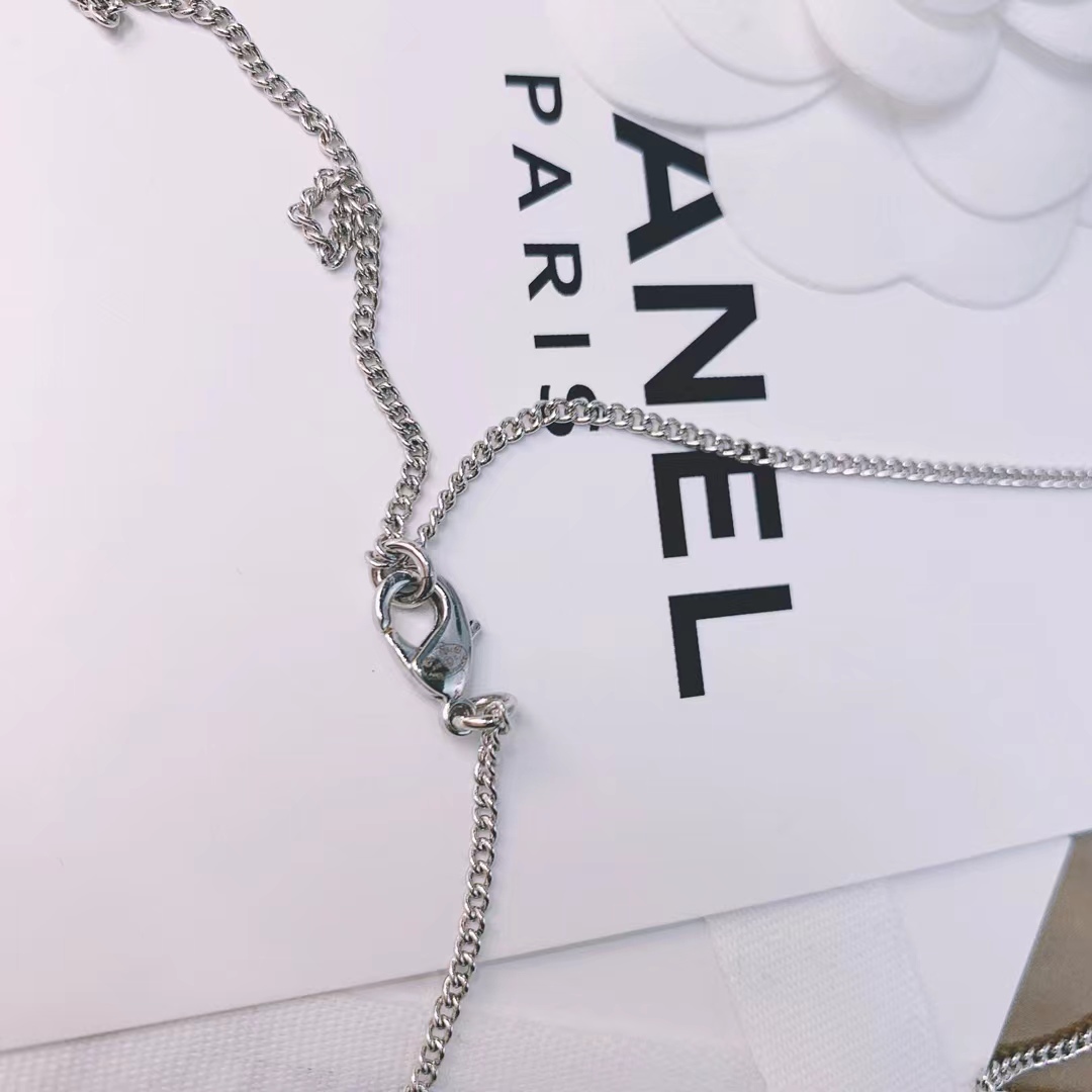 Buy replica Chanel Silver Color Tassel Pendant Necklace and replica jewelry from PICKS Jewelry