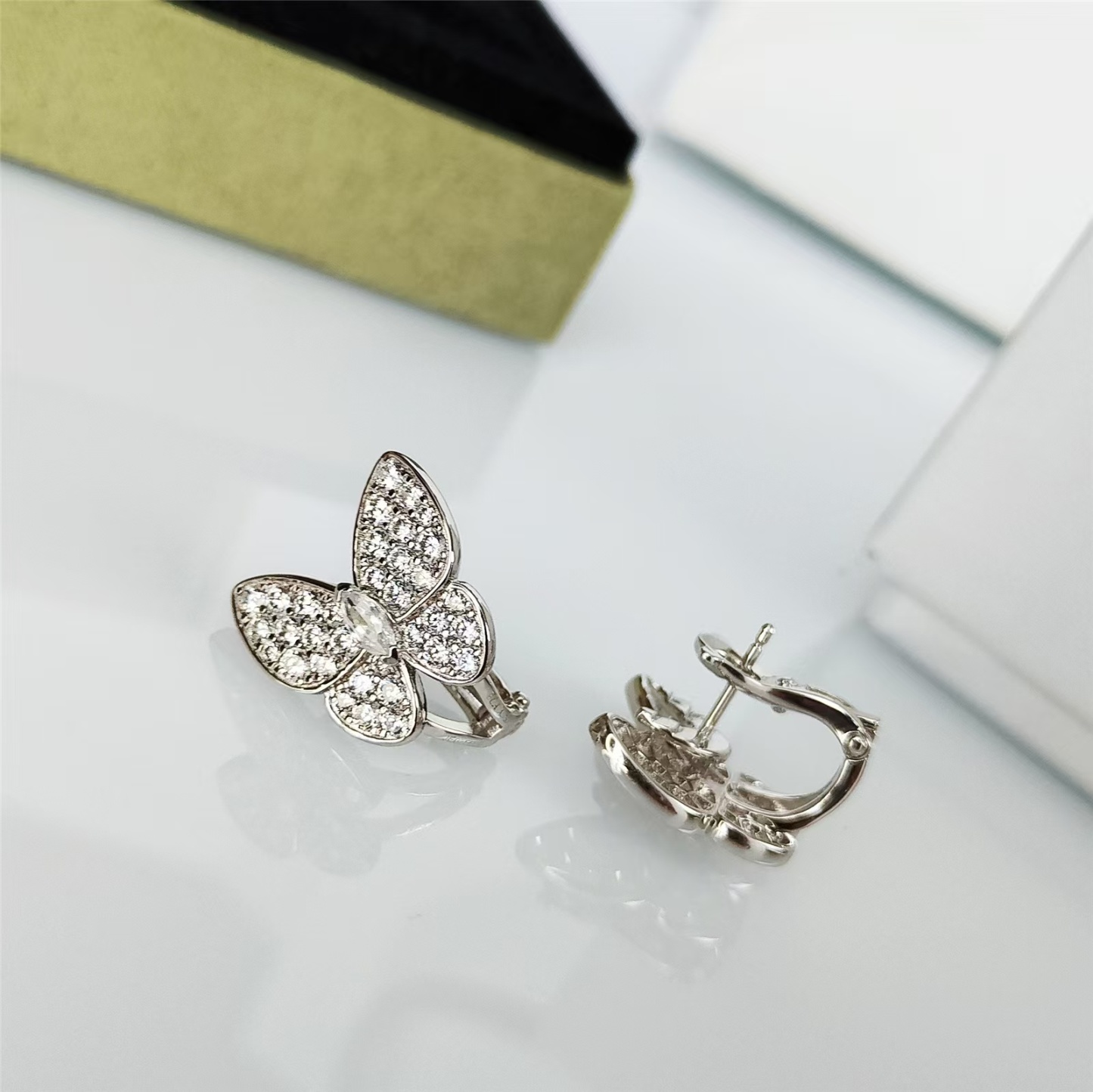 Buy replica Van Cleef & Arpels Two Butterfly Earrings and replica jewelry from PICKS Jewelry