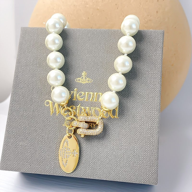 Buy replica Vivienne Westwood Horseshoe Clasp Saturn Pearl Necklace and replica jewelry from PICKS Jewelry