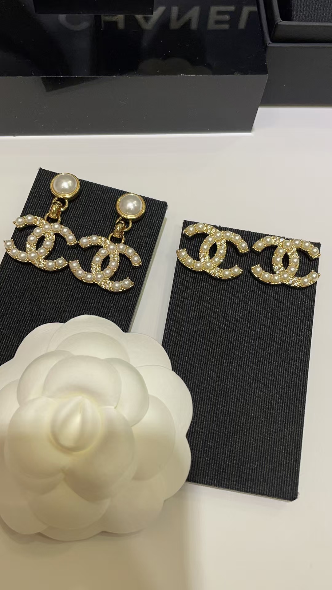 Buy replica Chanel Pearl Paved Double C Earrings and replica jewelry from PICKS Jewelry