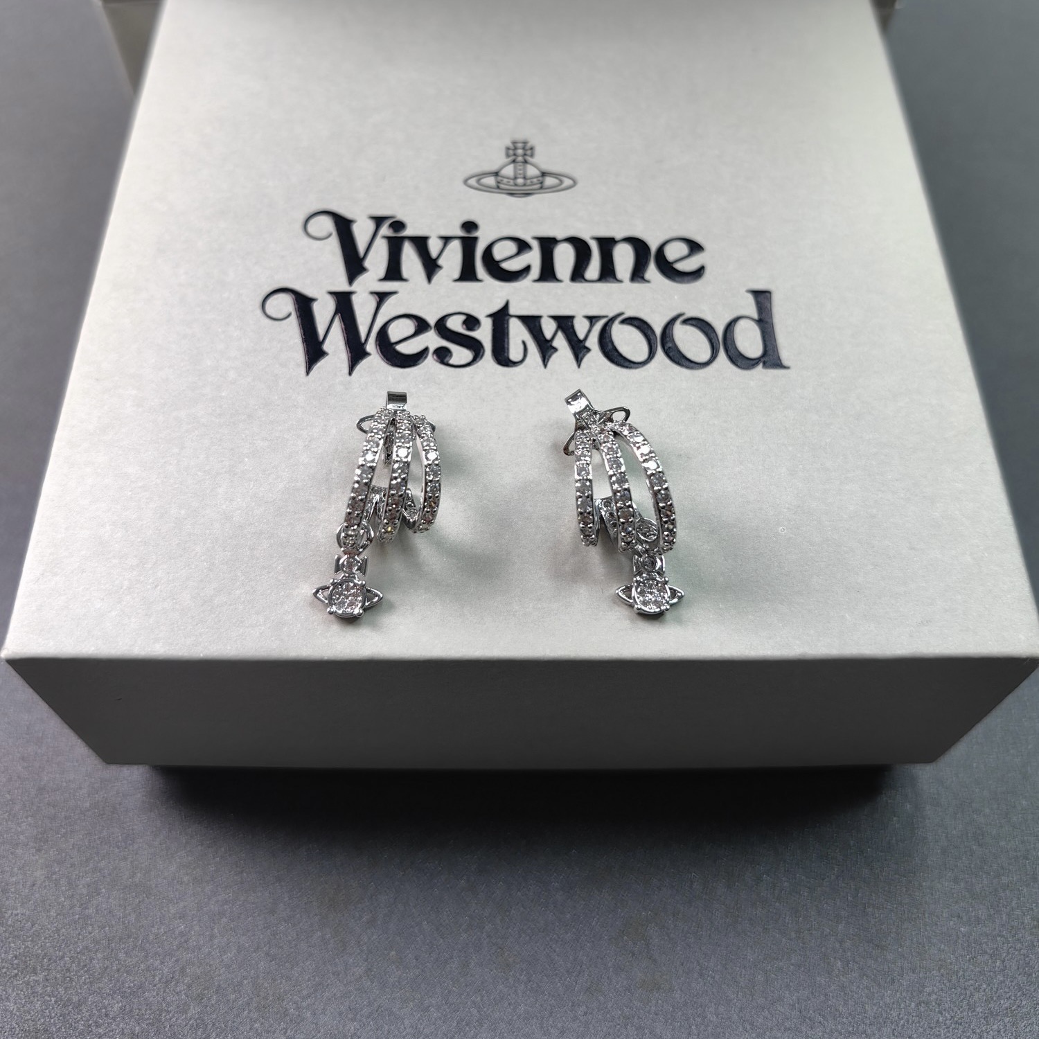 Buy replica Vivienne Westwood C Shape Saturn Drop Earrings and replica jewelry from PICKS Jewelry