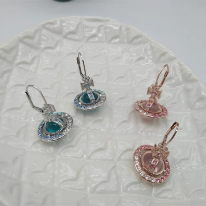 Buy replica Vivienne Westwood Gradient Color Diamond Crystal Ball Saturn Earrings and replica jewelry from PICKS Jewelry