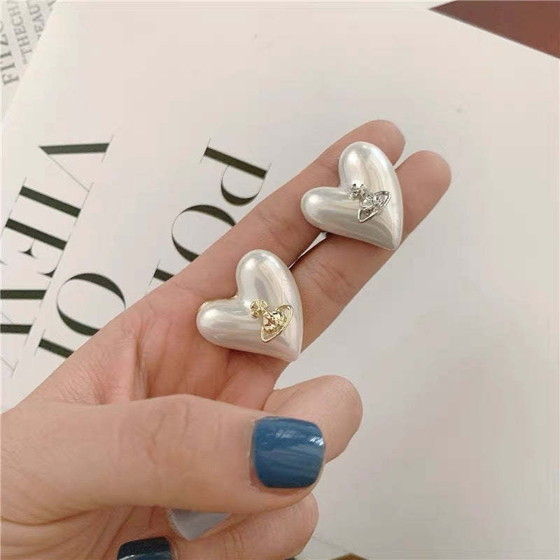 Buy replica Vivienne Westwood Heart Saturn Earrings and replica jewelry from PICKS Jewelry