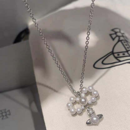 Buy replica Vivienne Westwood Pearl Planet Pendant Necklace and replica jewelry from PICKS Jewelry