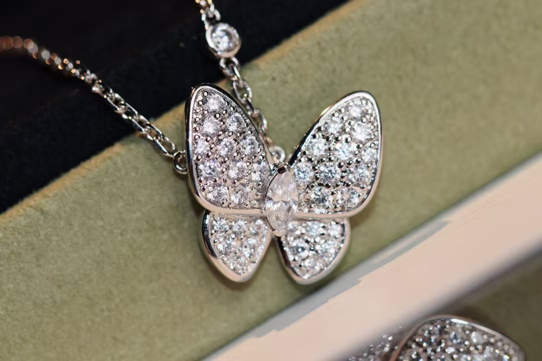 Buy replica Van Cleef & Arpels Two Butterfly Pendant Necklace and replica jewelry from PICKS Jewelry