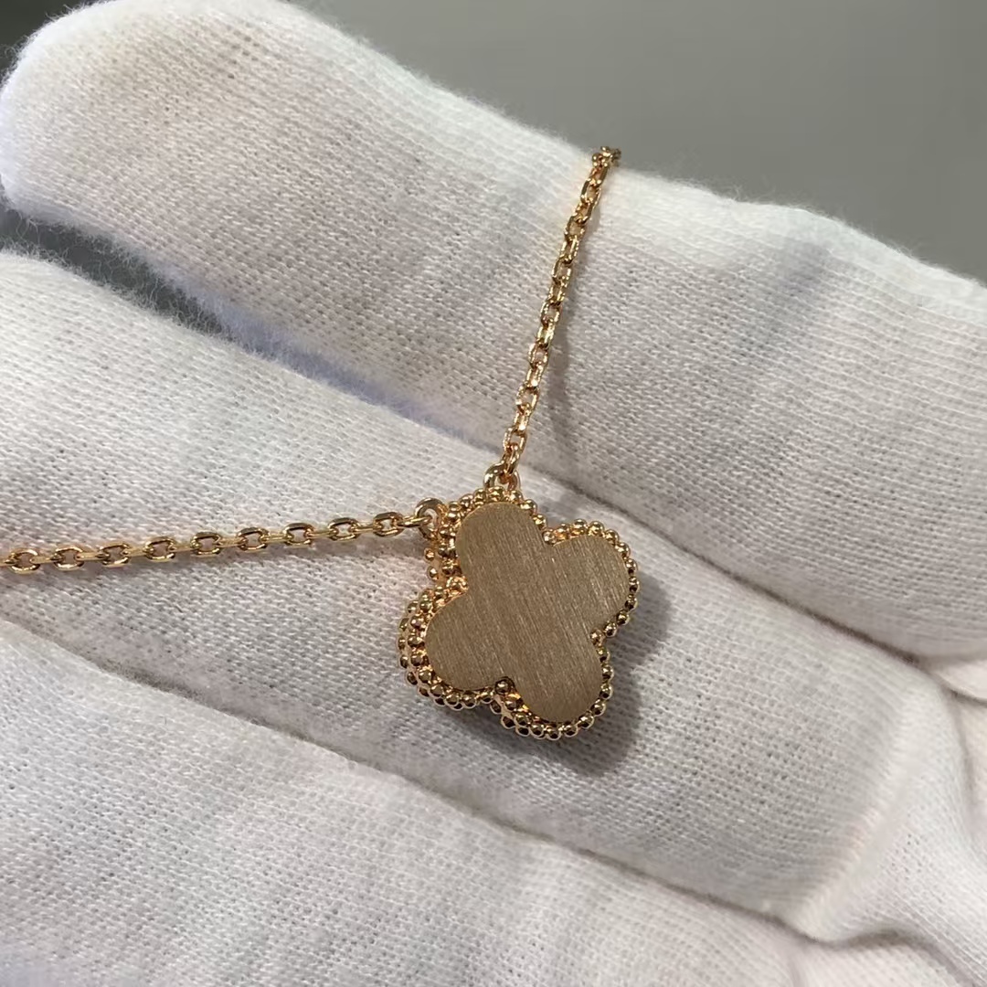 Buy replica Van Cleef & Arpels Rhodonite Vintage Alhambra Diamond 2021 Holiday Pendant Necklace and replica jewelry from PICKS Jewelry
