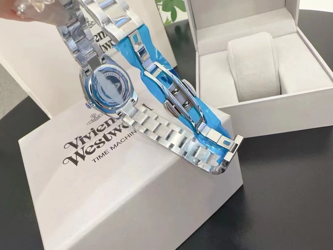 Buy replica Vivienne Westwood Light Blue Dial Silver Band Saturn Watch - 28MM and replica jewelry from PICKS Jewelry
