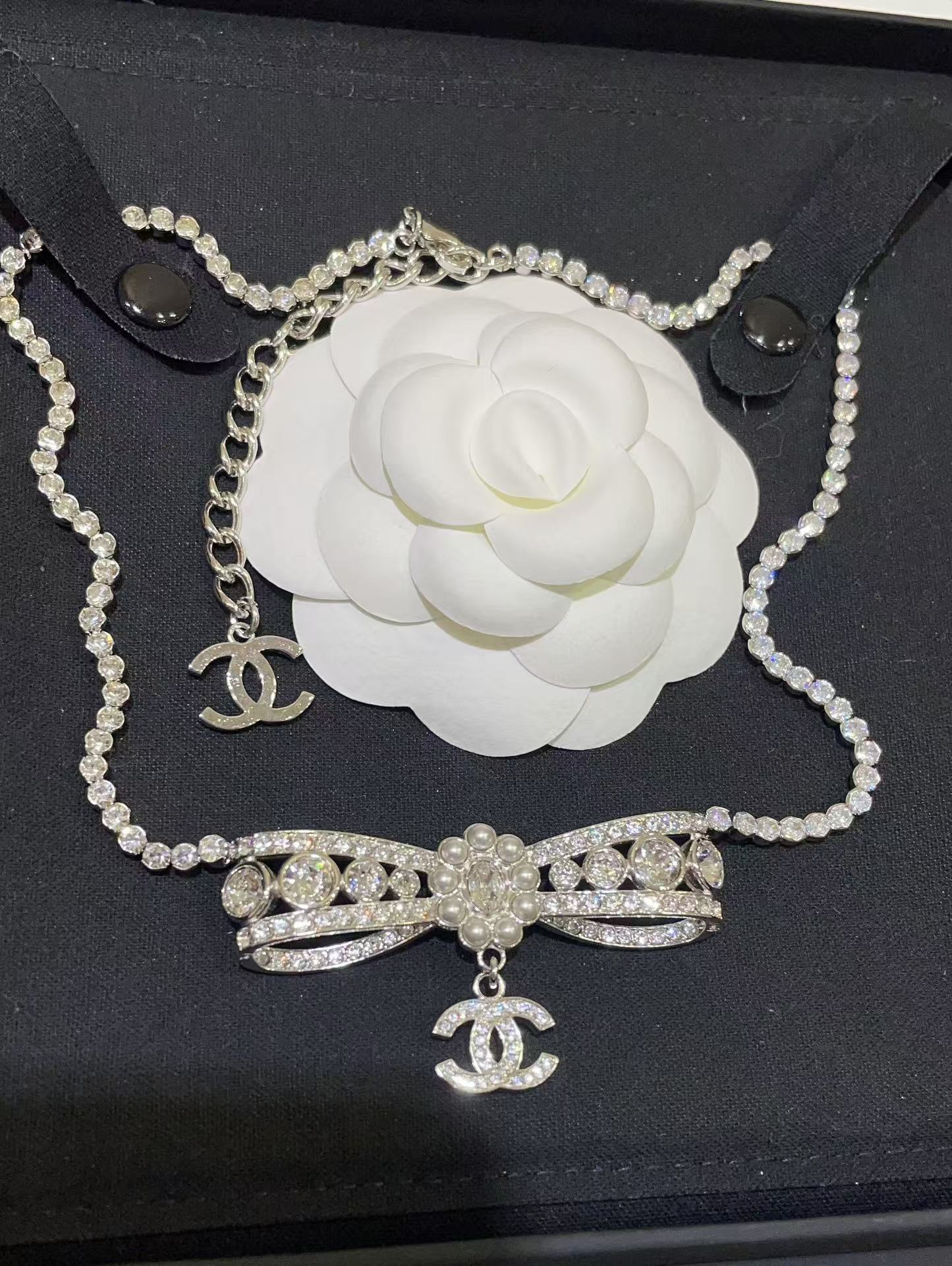 Buy replica Chanel Rhinestone Strass Bowknot Pendant Necklace and replica jewelry from PICKS Jewelry
