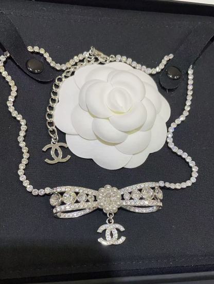 Buy replica Chanel Rhinestone Strass Bowknot Pendant Necklace and replica jewelry from PICKS Jewelry