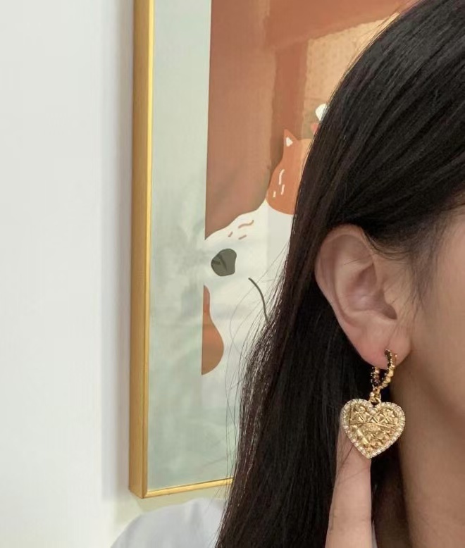 Buy replica Chanel Hoop with Heart Dangle Earrings and replica jewelry from PICKS Jewelry