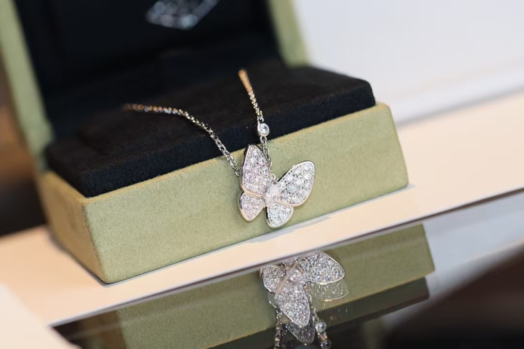 Buy replica Van Cleef & Arpels Two Butterfly Pendant Necklace and replica jewelry from PICKS Jewelry