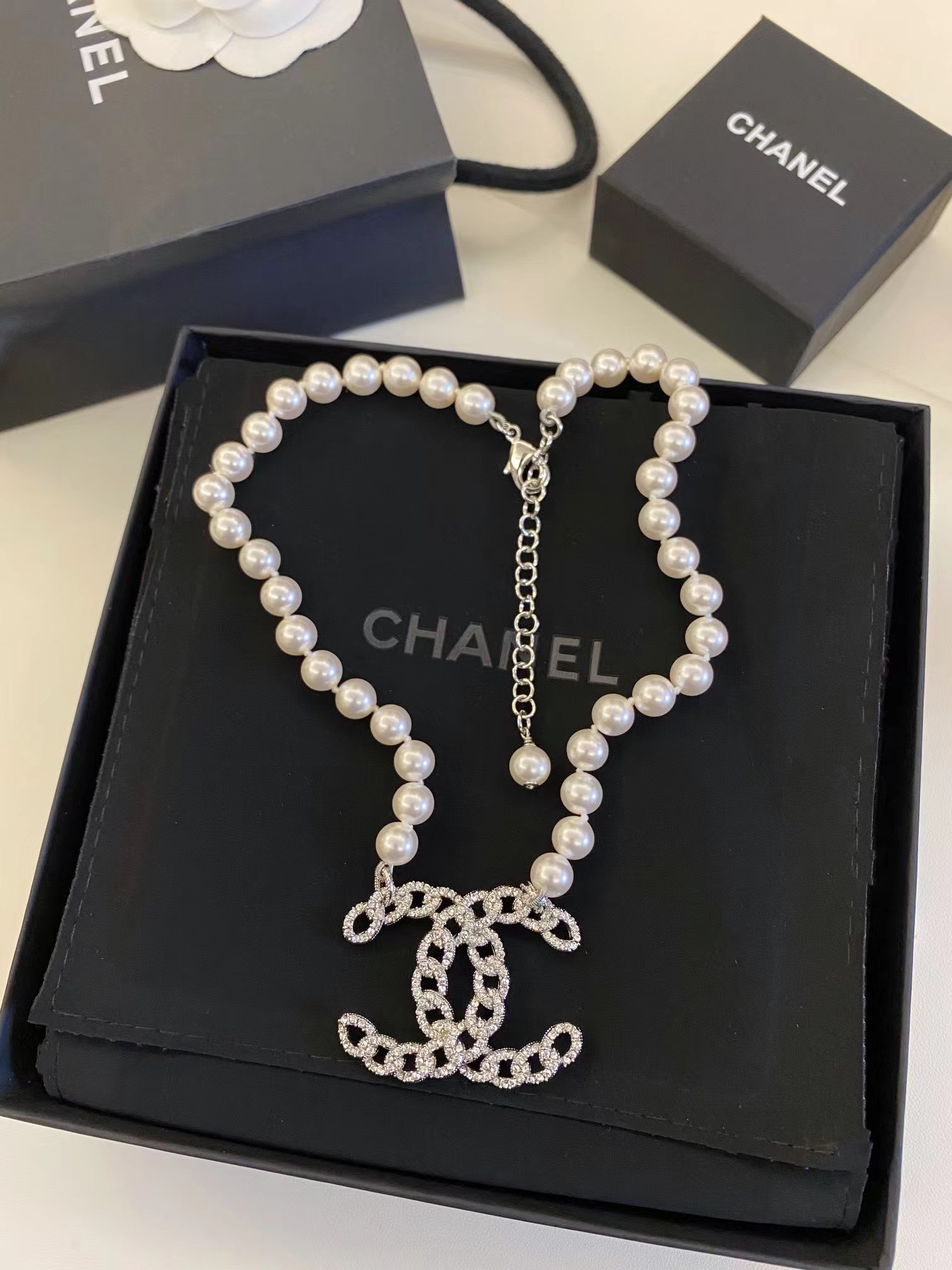 Buy replica Chanel Hollow Big Double C Pendant Pearl Necklace and replica jewelry from PICKS Jewelry