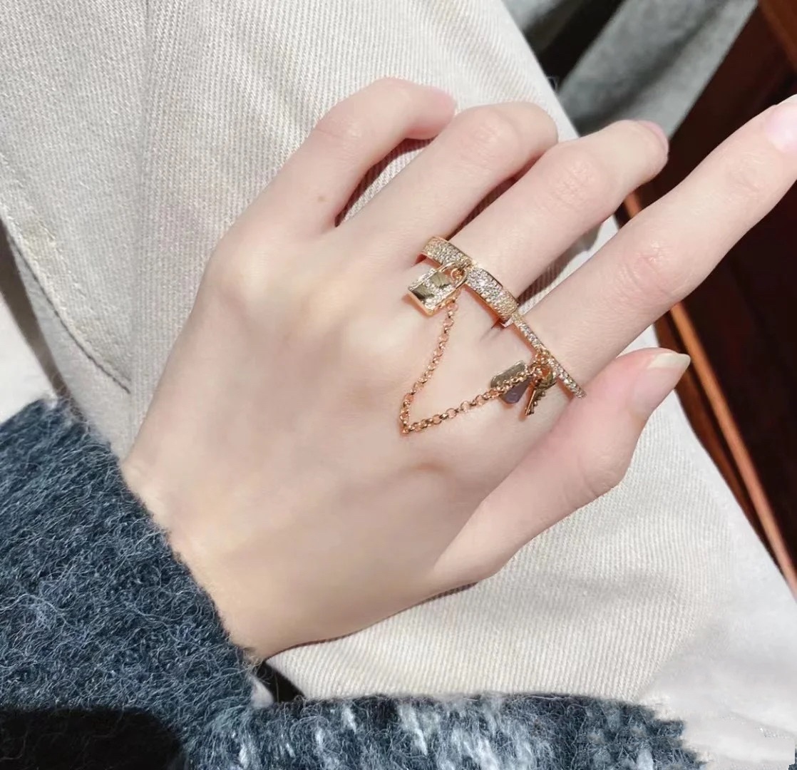 Buy replica Hermes Double Finger Key and Lock Ring and replica jewelry from PICKS Jewelry