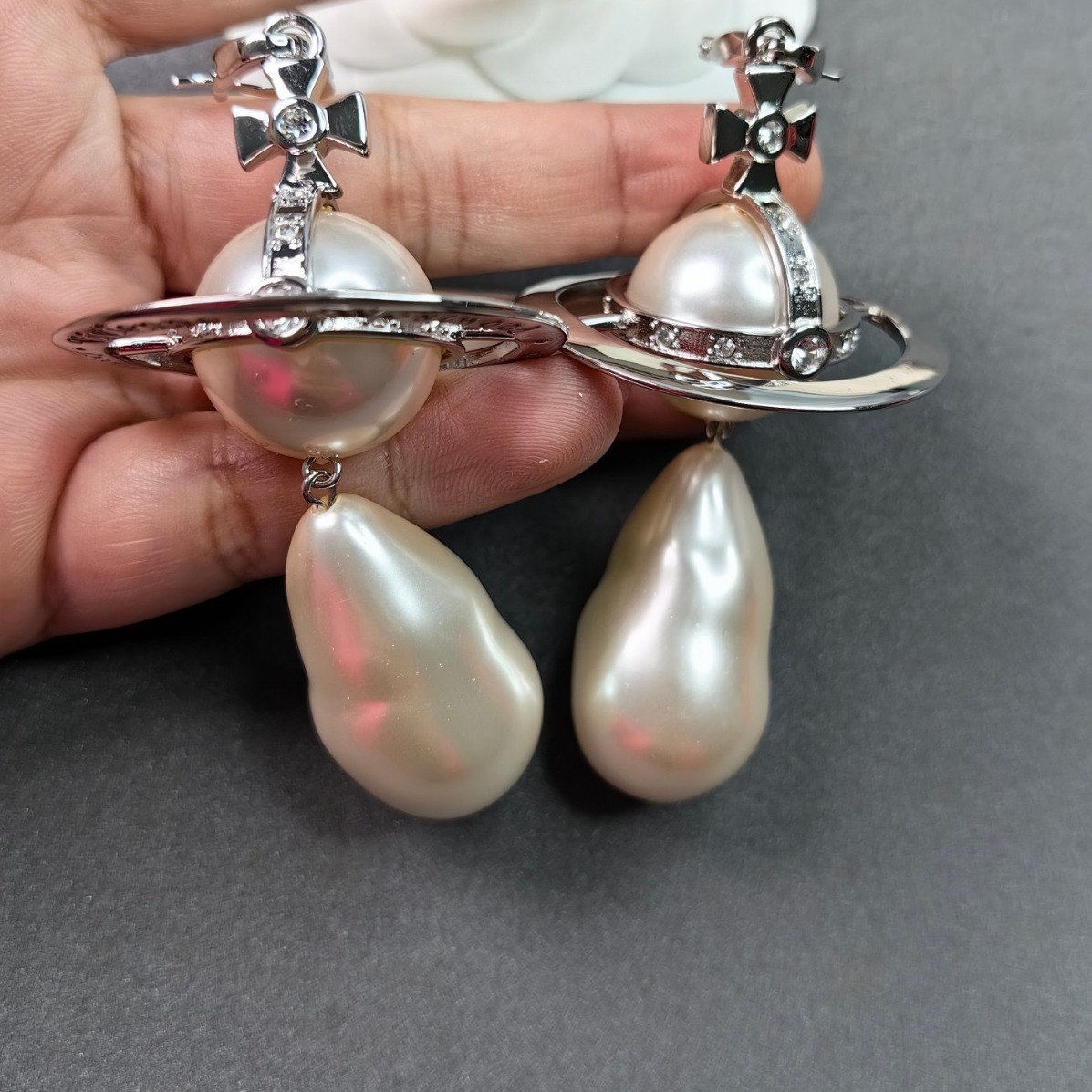 Buy replica Vivienne Westwood Exaggerated Large Baroque Pearl Earrings and replica jewelry from PICKS Jewelry