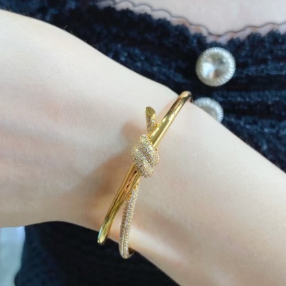 Buy replica Tiffany Knot Double Row Hinged Bangle and replica jewelry from PICKS Jewelry