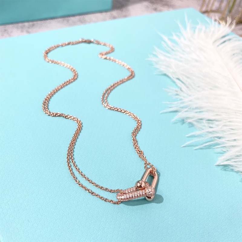 Buy replica Tiffany Diamond Double Horseshoe Clasp Pendant Necklace and replica jewelry from PICKS Jewelry