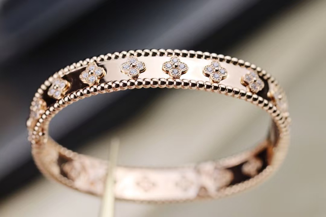 Buy replica Van Cleef & Arpels Perlée Clovers Bracelet, Medium Bangle and replica jewelry from PICKS Jewelry