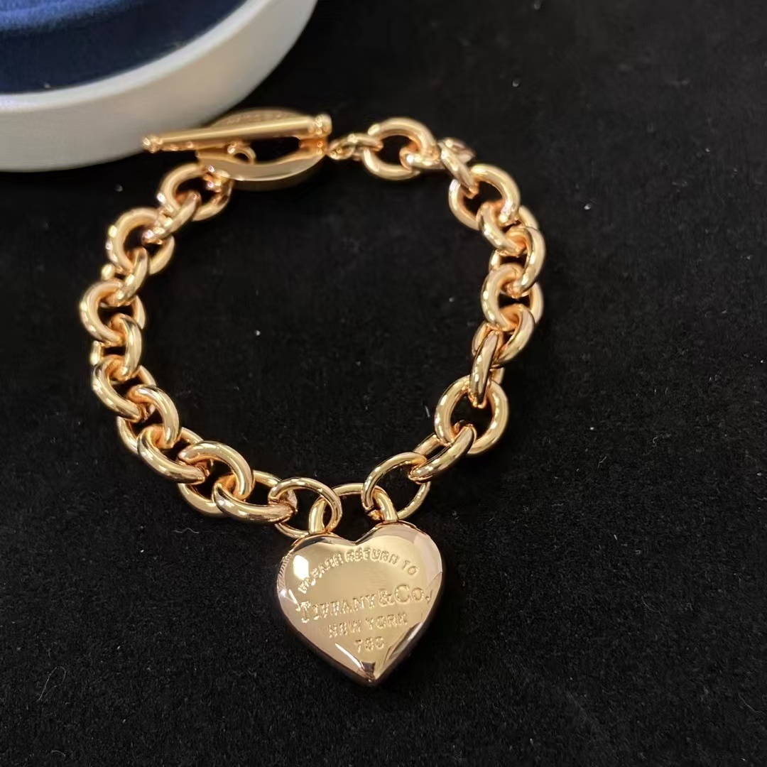 Buy replica Tiffany Heart Charm OT Clasp Bracelet and replica jewelry from PICKS Jewelry