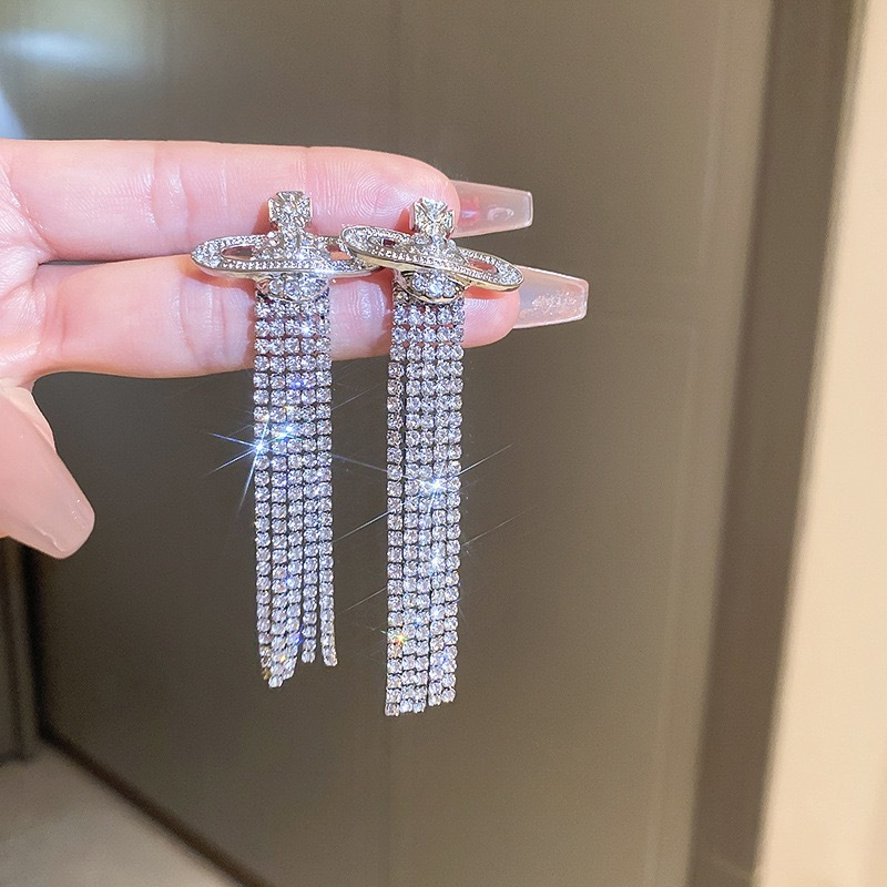 Buy replica Vivienne Westwood Party Queen Rhinestone Tassel Saturn Earrings and replica jewelry from PICKS Jewelry