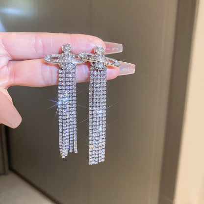 Buy replica Vivienne Westwood Party Queen Rhinestone Tassel Saturn Earrings and replica jewelry from PICKS Jewelry