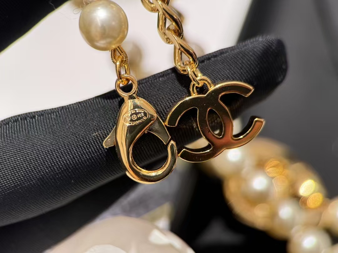 Buy replica Chanel Round Double C Pendant Pearl Choker Necklace and replica jewelry from PICKS Jewelry