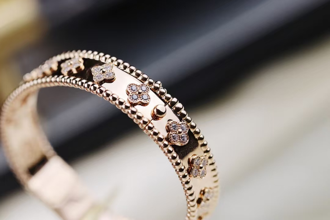 Buy replica Van Cleef & Arpels Perlée Clovers Bracelet, Medium Bangle and replica jewelry from PICKS Jewelry